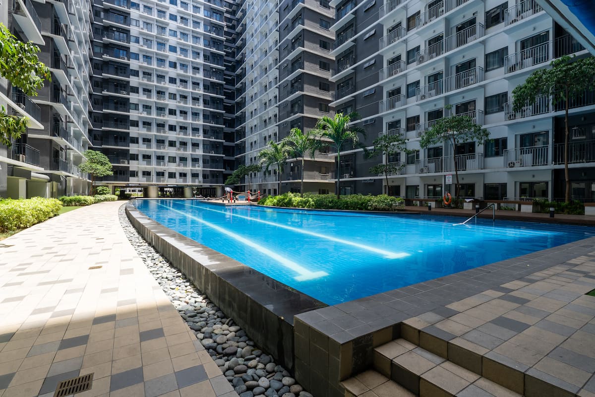Daytime resort-style pool at MOA Shore 3, near MOA and NAIA