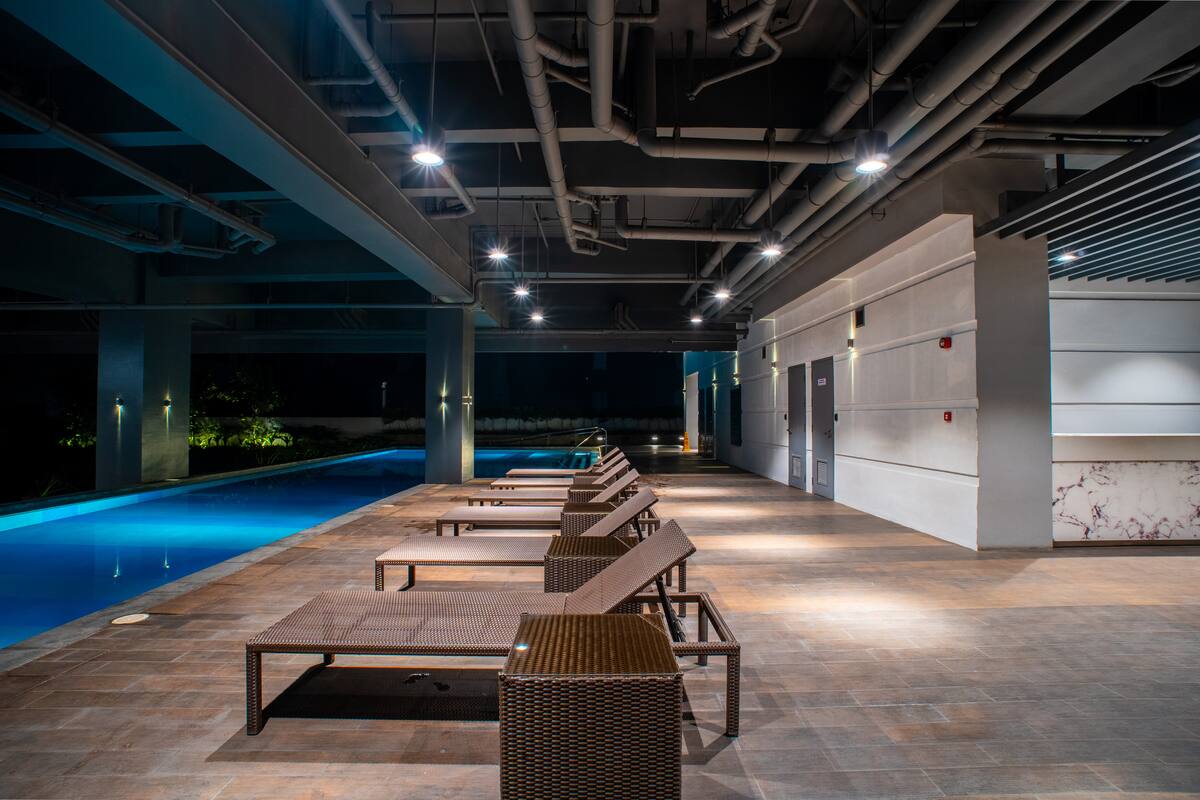 Moody night pool lounge at Urban Oasis in Quezon City
